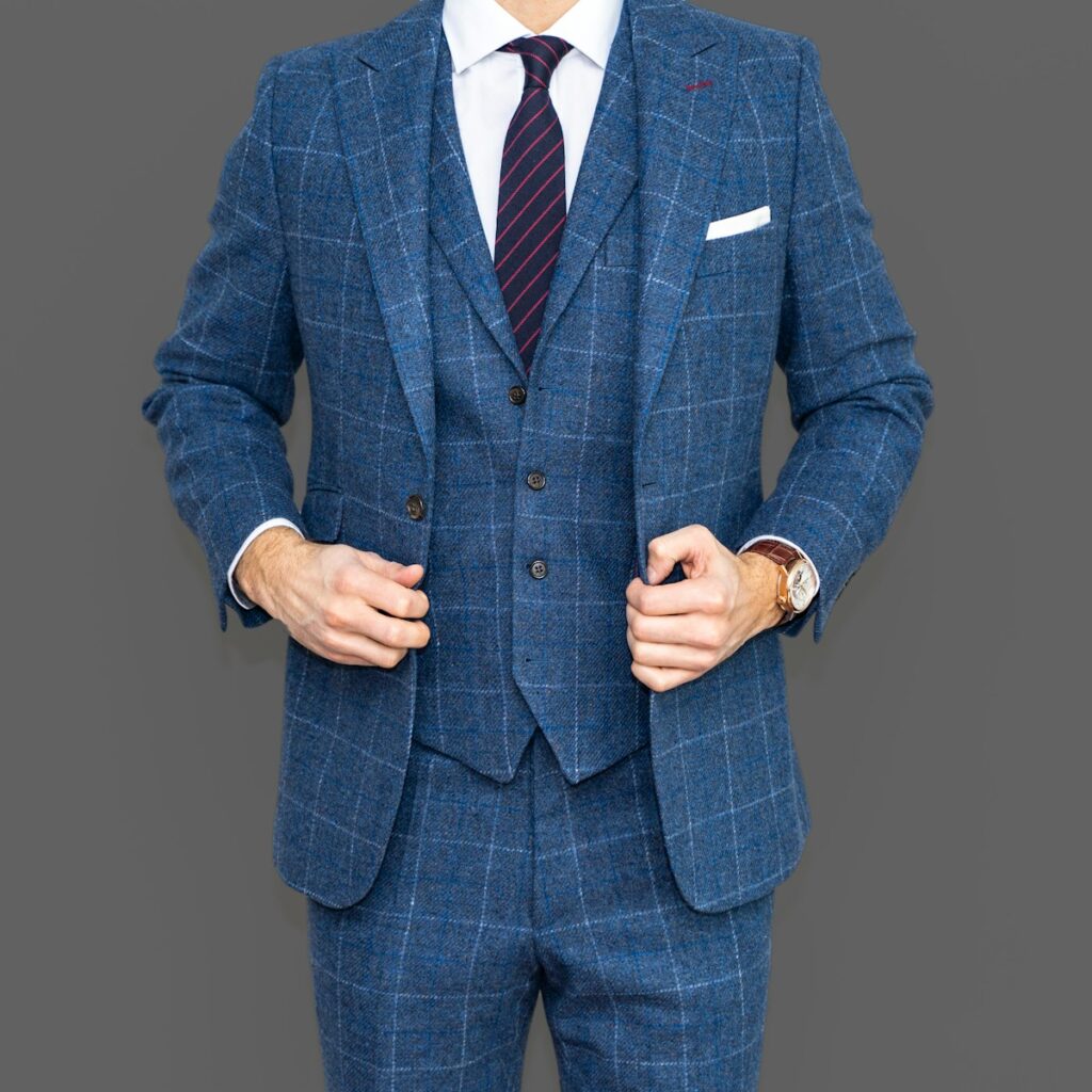man in blue suit jacket